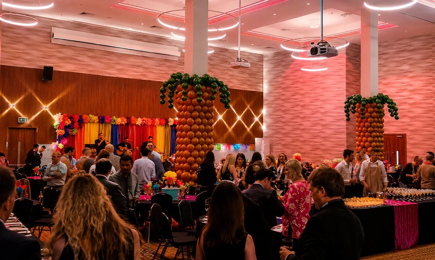 ConocoPhillips Latin Night event with balloon palm trees, Latin decor and a live band on stage
